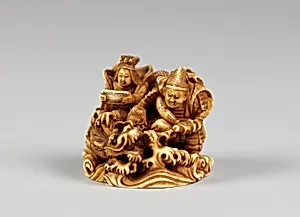 Netsuke of Two Seated Figures and a Dragon