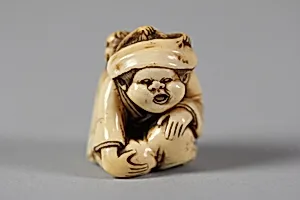 Netsuke of Woman and Monkey