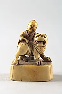 Netsuke of Boy with Dog