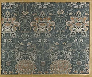 Textile fragment with repeating pattern of chrysanthemums and peonies in floral arabesque