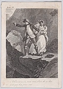 A couple standing on a mountain
