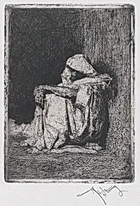 A Moroccan man seated on the ground