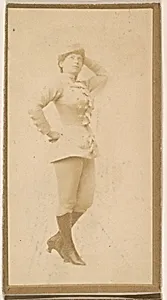 Actress leaning against wall, from the Actresses series (N664) promoting Old Fashion Fine Cut Tobacco