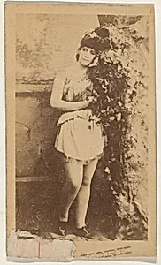 Actress leaning on ivy-covered prop tree, from the series Actresses (N674), promoting New York Dandies by Unknown Artist