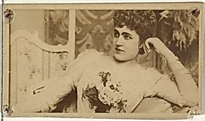[Actress lounging while holding bouquet of flowers], from the Actors and Actresses series (N145-8) issued by Duke Sons & Co. to promote Duke Cigarettes by American Tobacco Company|W. Duke, Sons & Co.