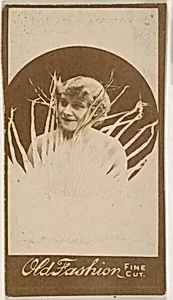 Actress posing behind reeds, from the Actresses series (N664) promoting Old Fashion Fine Cut Tobacco