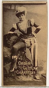 Actress posing on pile of boulders, from the Actors and Actresses series (N145-1) issued by Duke Sons & Co. to promote Cross Cut Cigarettes by W. Duke, Sons & Co.