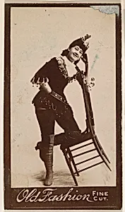 Actress posing on tilted chair, from the Actresses series (N664) promoting Old Fashion Fine Cut Tobacco