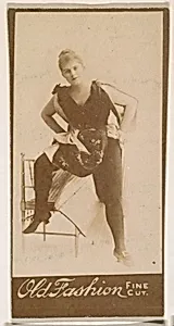Actress posing with foot on chair, from the Actresses series (N664) promoting Old Fashion Fine Cut Tobacco