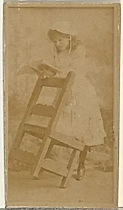 [Actress reading book while leaning on chair], from the Actors and Actresses series (N145-8) issued by Duke Sons & Co. to promote Duke Cigarettes by American Tobacco Company|W. Duke, Sons & Co.