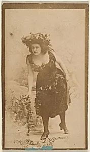 Actress wearing costume with floral headpiece, from the Actresses series (N668) by Unknown Artist