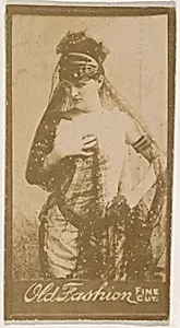 Actress wearing costume with lace head scarf, from the Actresses series (N664) promoting Old Fashion Fine Cut Tobacco
