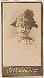 Actress wearing feathered hat, from the Actresses series (N664) promoting Old Fashion Fine Cut Tobacco
