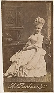 Actress wearing feathered hat, from the Actresses series (N664) promoting Old Fashion Fine Cut Tobacco