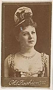 Actress wearing floral hat, from the Actresses series (N664) promoting Old Fashion Fine Cut Tobacco