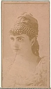 [Actress wearing ornate cap], from the Actors and Actresses series (N145-8) issued by Duke Sons & Co. to promote Duke Cigarettes by W. Duke, Sons & Co.|American Tobacco Company