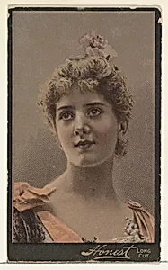 Actress wearing pink flower in hair, from Stars of the Stage, Third Series (N131) issued by Duke Sons & Co. to promote Honest Long Cut Tobacco by W. Duke, Sons & Co.|American Tobacco Company|Joseph P. Knapp