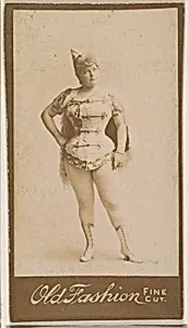 Actress wearing pointed cap, from the Actresses series (N664) promoting Old Fashion Fine Cut Tobacco