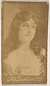 Actress with long hair, from the Actresses series (N664) promoting Old Fashion Fine Cut Tobacco