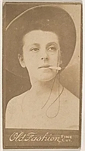 Actress with monocle and cigarette, from the Actresses series (N664) promoting Old Fashion Fine Cut Tobacco by Unknown Artist