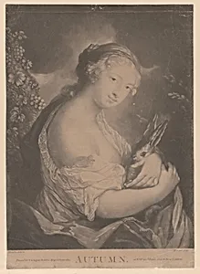 Autumn: a young woman holding a rabbit