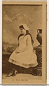 Card Number 69, Miss Smith, from the Actors and Actresses series (N145-2) issued by Duke Sons & Co. to promote Cross Cut Cigarettes by W. Duke, Sons & Co.