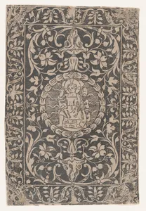 Christ as a child, seated, right hand raised in gesture of blessing, surrounded by elaborate ornament