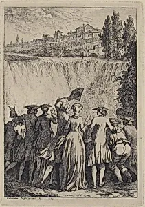 Group of People Looking at a Waterfall