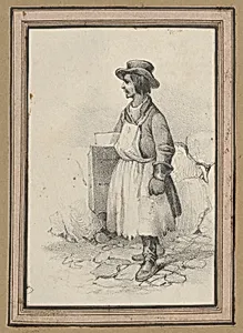 Man wearing an apron and a hat