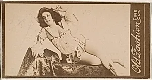 Reclining actress, from the Actresses series (N664) promoting Old Fashion Fine Cut Tobacco
