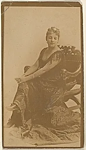 Seated actress with hands resting on knees, from the Actresses series (N668) by Unknown Artist
