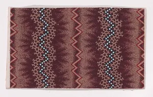 Textile Design with Alternating Vertical Zig-Zagging Strips and Pearls