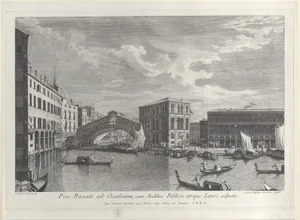 The Rialto Bridge, Venice, with boats and gondolas in the water