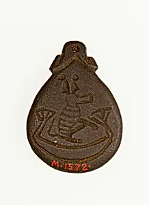 Amulet illustrating a baboon in a boat