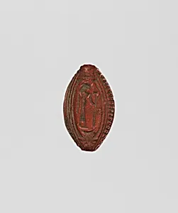 Cowroid with a standing female figure