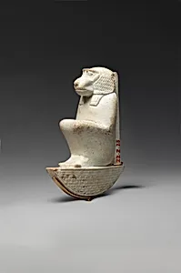 Figure of baboon on a basket and with a pillar, the shebet offering