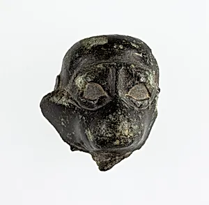 Head of a monkey from an ointment vessel