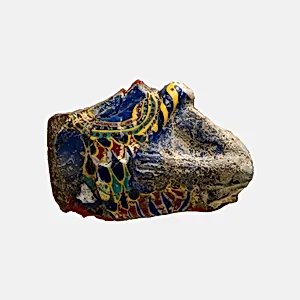 High relief inlay fragment, frontal bust of a god in a feather garment and holding a scepter