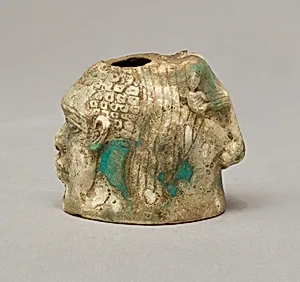 Janus-faced aryballos depicting a Nubian and a bull