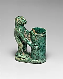 Kohl Tube in the Shape of a Monkey Holding a Vessel