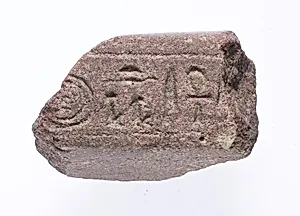Offering table fragment with cartouche and epithets of Aten