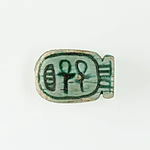 Plaque in the Form of a Cartouche; two ankhs; ankh, two nefers