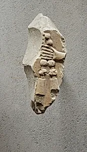 Relief of a hand with part of necklace - see 26.3.353-3 by Unknown Artist
