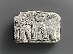 Relief plaque, upper part of crocodile-headed god