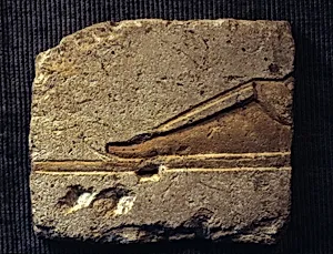 Relief with a royal foot