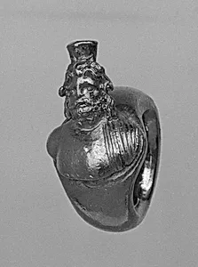 Ring with bezel in the form of a bust of Serapis