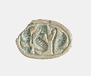 Scarab with the Representation of a Falcon-headed Figure Between Uraei