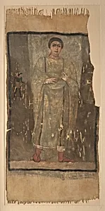 Shroud of a Woman Wearing a Fringed Tunic