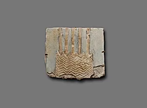 Tile with five stems of a papyrus plant