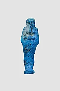Uninscribed shabti from tomb of Nespekashuty